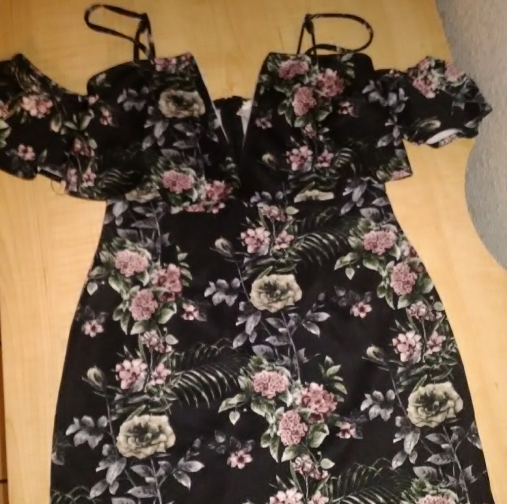 Low cut mini black dress with floral pattern